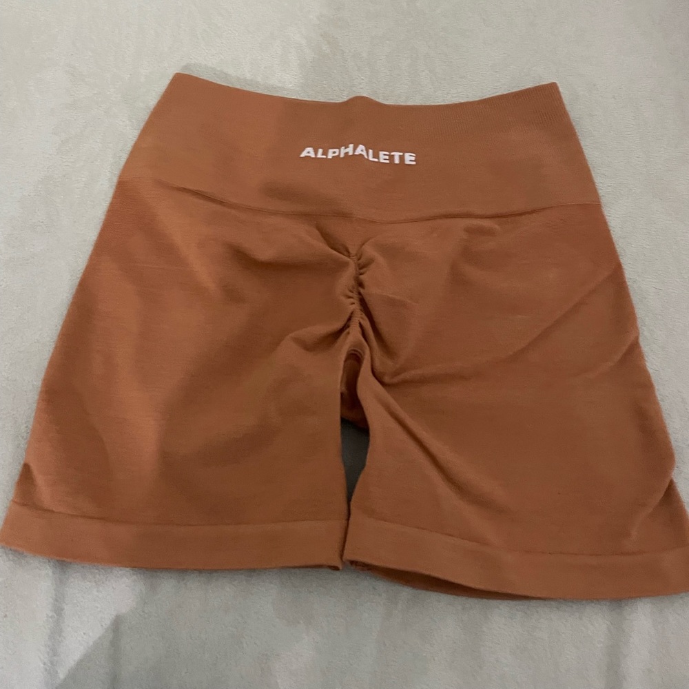 Alphalete amplify shorts in mandarin